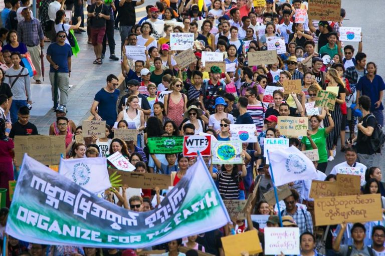 Hundreds of people in Yangon take part in the Global Climate Strike in 2019. (AFP)