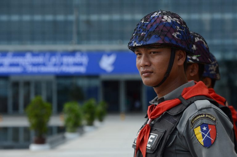 Police watch over the Myanmar International Convention Centre in  Nay Pyi Taw on August 30, 2016. (AFP)