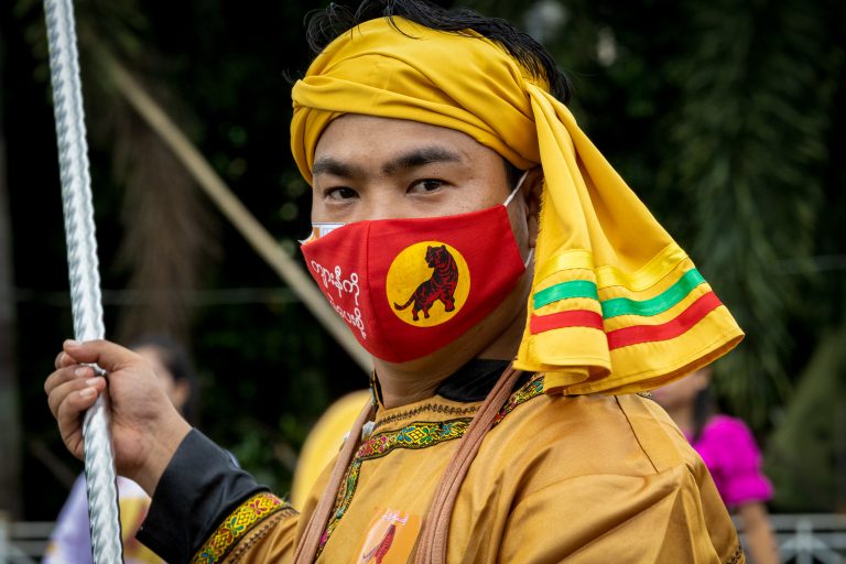 A Tai-Leng Nationalities Development Party supporter campaigns in Myitkyina in August 2020. (J.M. Elizabeth | Frontier)