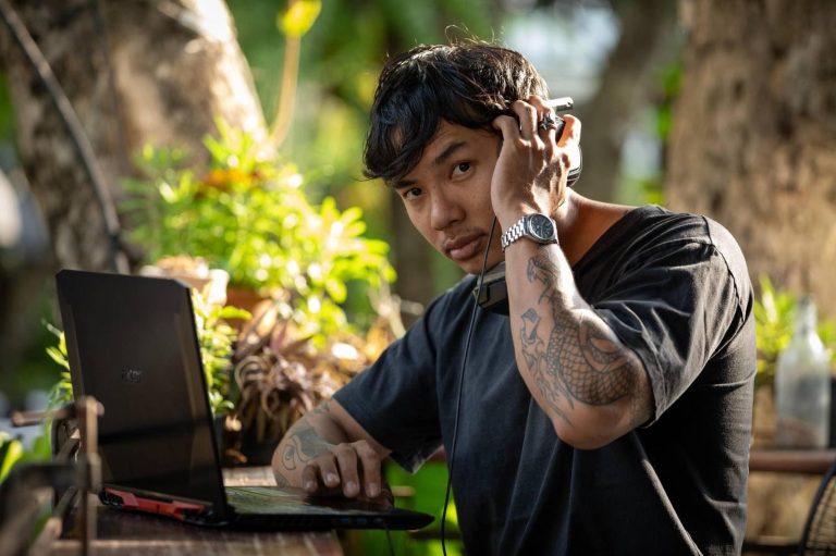 Producer-emcee Kan Kyi works on his music in Chiang Mai on November 22. (Frontier)