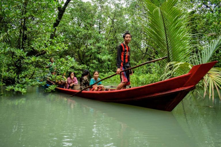 Residents search for crab and prawns in the Kanyin Chaung community forest in Tanintharyi Region's Thayetchaung Township. (Frontier)